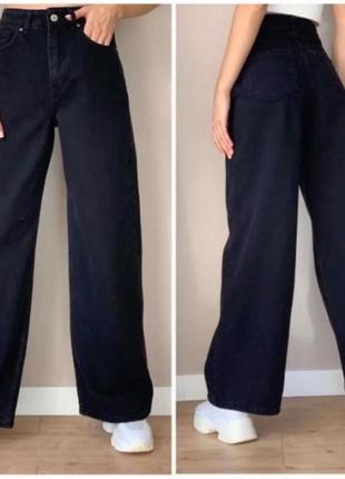 Женские джинсы палаццо с широкими штанинами черного цвета2 фото