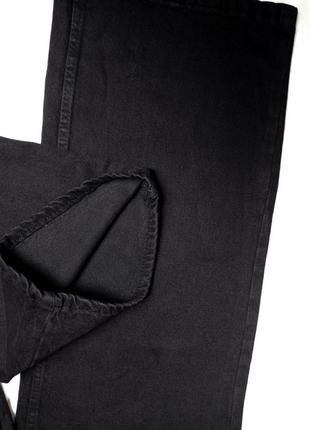 Женские джинсы палаццо с широкими штанинами черного цвета8 фото