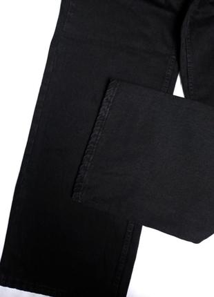 Женские джинсы палаццо с широкими штанинами черного цвета7 фото