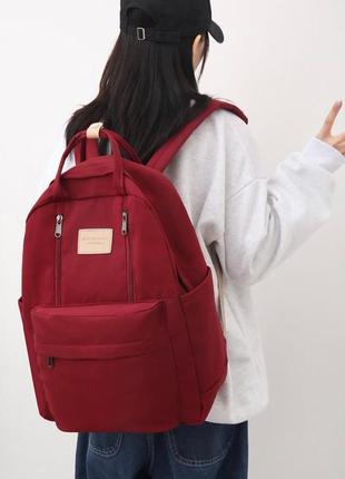 Текстильный рюкзак с ручками и брелком. бордовый2 фото