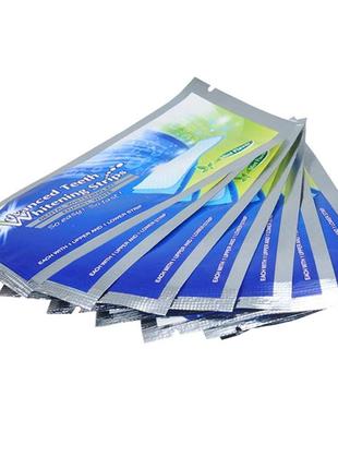 Американські відбілюючі смужки для зубів 3d white teeth whitening strips,14 шт4 фото