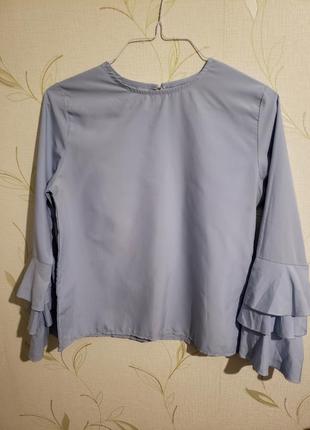 Блуза с воланами