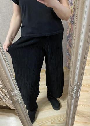 Чёрные трикотажные широкие брюки на резинке 48-52 р италия4 фото