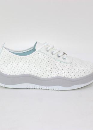 Стильні легкі білі жіночі літні кросівки перфоровані,шкіряні(екошкіра) жіноче взуття весна-літо6 фото