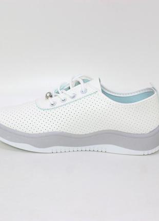 Стильні легкі білі жіночі літні кросівки перфоровані,шкіряні(екошкіра) жіноче взуття весна-літо7 фото