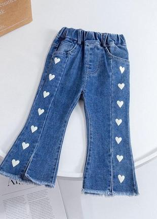 Стильні джинси кльош з розрізами для дівчинки