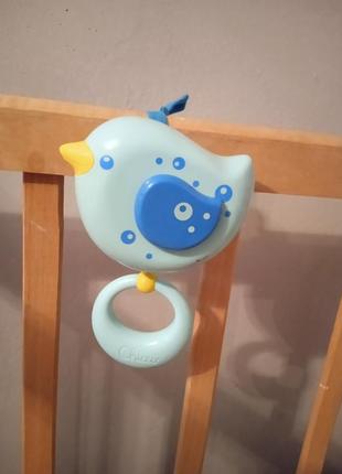 Музыкальная механическая игрушка chicco "птичка" для детской кроватки