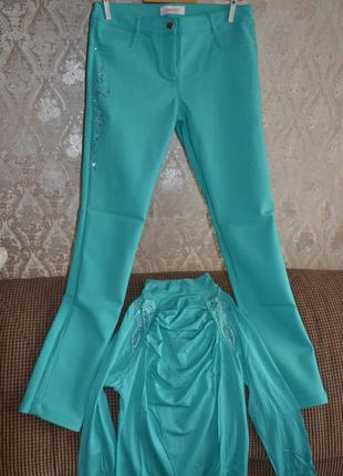 Модний костюм sassofono м'ятно-бірюзового кольору (скіні і водолазка)1 фото