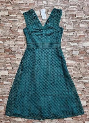 Красивое ажурное зеленое платье миди reserved без рукавов.3 фото