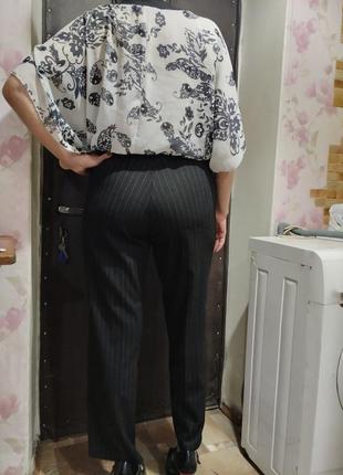Женские брюки черного цвета7 фото
