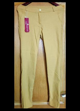 Легкие стрейчевые брюки/ джинсы louis s&h4 фото