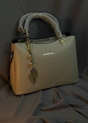 Классическая женская сумочка из экокожи3 фото