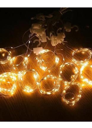 Світлодіодна гірлянда штора 3*2 м з гачками 8 режимів роботи колір тепло-жовтий7 фото