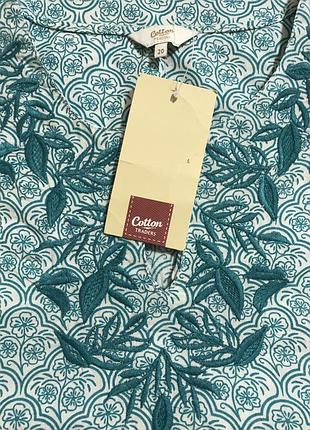 Очень красивая и стильная брендовая блузка в цветах...100% котон 21.