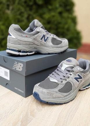 Мужские кроссовки new balance 2002r темно серые с синей скидкой sale &lt;unk&gt; smb10 фото