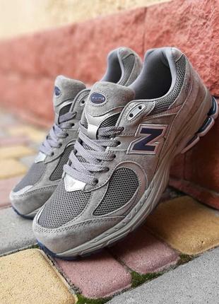 Мужские кроссовки new balance 2002r темно серые с синей скидкой sale <unk> smb