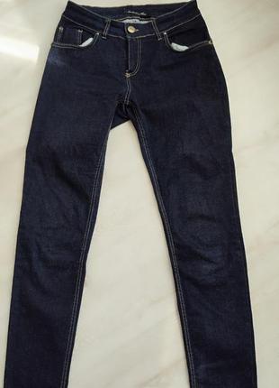 Темно синие джинсы средней посадки1 фото