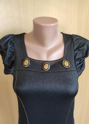 Сукня з кишенями і гудзиками