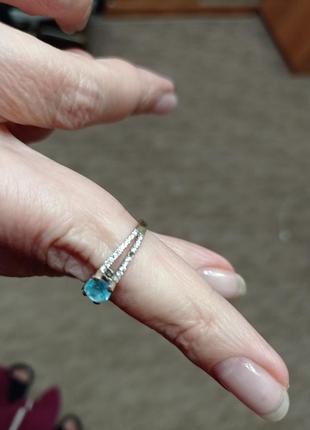 Серебряное кольцо с голубым топазом5 фото