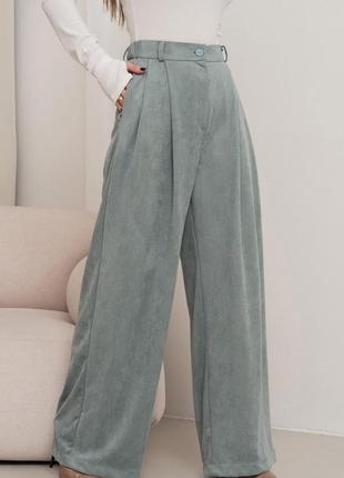 Оливковые свободные брюки палаццо из эко-замши2 фото