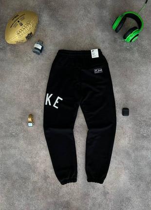 Шикарные и качественные брюки nike6 фото