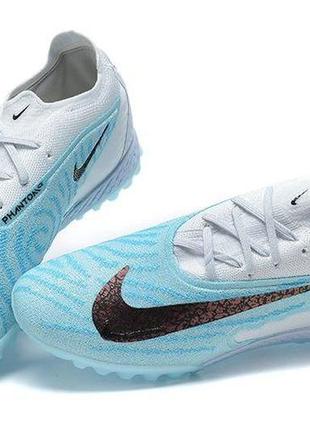 Футбольні сороконожки nike phantom gx academy fg7 фото