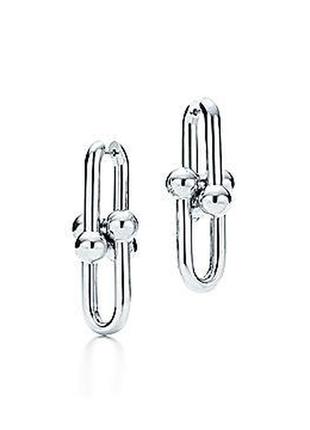 Изысканные серебряные серьги тиффани в виде звеньев от tiffany & co: символ стиля и элегантности