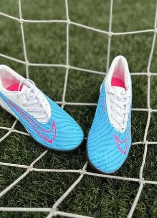 Футбольні сороконожки nike phantom gx academy tf9 фото