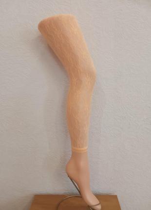 Мереживні помаранчеві лосини для дівчинки віком 7-9 років