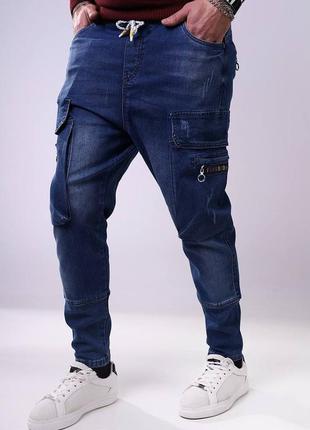 Стильні зручні сині чоловічі джинси карго чоловічі джинси з накладними кишенями джинси-карго демісезонні чоловічі джинси на резинці в поясі1 фото