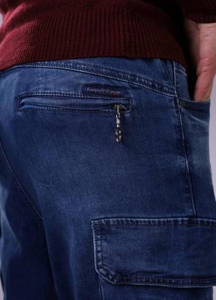 Стильні зручні сині чоловічі джинси карго чоловічі джинси з накладними кишенями джинси-карго демісезонні чоловічі джинси на резинці в поясі6 фото