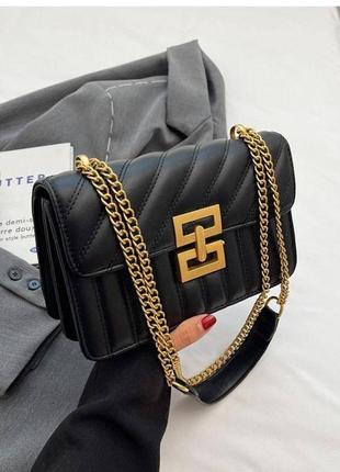 Черная сумочка кросс-боди с эко-кожей на цепочке.2 фото