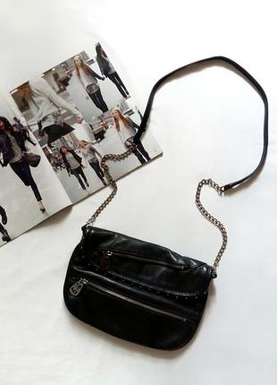 Черная плоская сумочка sisley на длинном ремешке1 фото