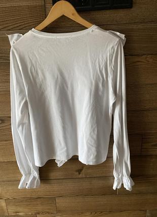 Білосніжна блуза- хмаринка з обʼємними рюшами3 фото