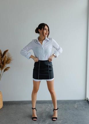 Женский деловой костюм удлиненная рубашка софт и кожаная юбка мини классический комплект