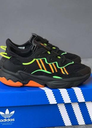 Женские кроссовки черные с оранжевым в стиле adidas ozweego black orange green