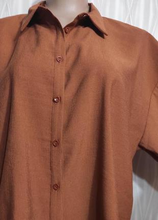 Жіноча сорочка/блузка вільного силуету.