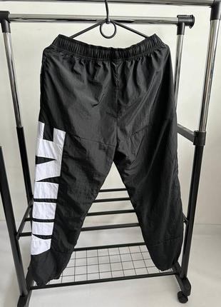 Новые и оригинальные! нейлоновые брюки nike pants весенние найк6 фото