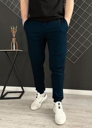Демісезонні базові однотонні спортивні штани сині1 фото