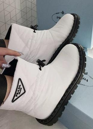 Prada quilted nylon snow boots white