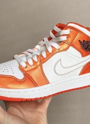 Jordan 1 mid electro orange