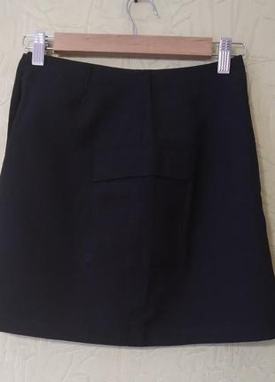 Школьная юбка с карманами.3 фото