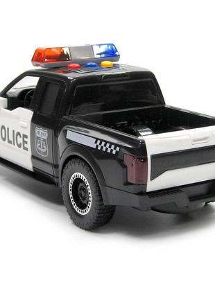 Детская машинка полиция ford raptor с звуками и светом инерционная5 фото