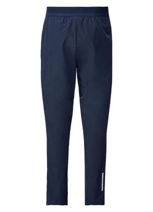 Спортивні штани regular fit із функціональної тканини для чоловіка crivit 410701 l темно-синій2 фото