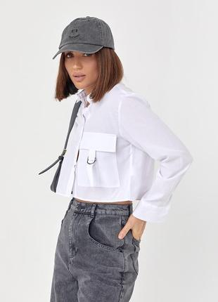 Укороченная женская рубашка с накладным карманом.8 фото