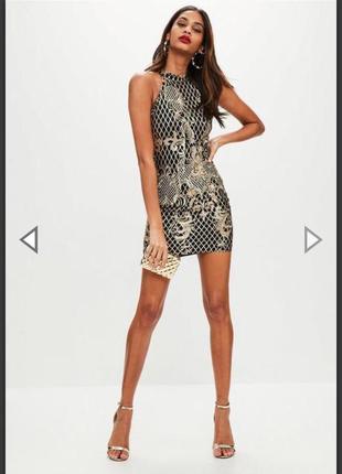 Круте плаття чорно із золотом, золота вишивка, відкрита спина