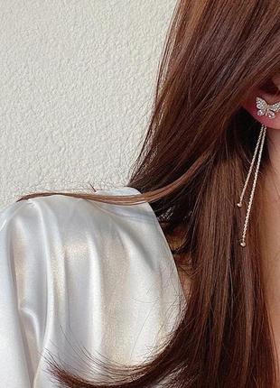 Длинные серьги с метеотелями со стразами