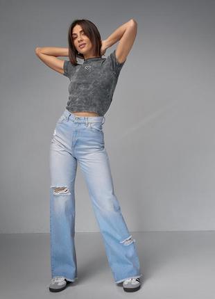Трендовые женские джинсы с рваностями1 фото