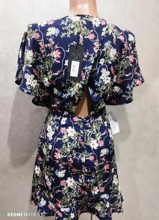 Шикарная модель платья в цветочный принт британского бренда ax paris. новая, с биркой5 фото
