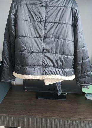Тепла курточка stradivarius.2 фото